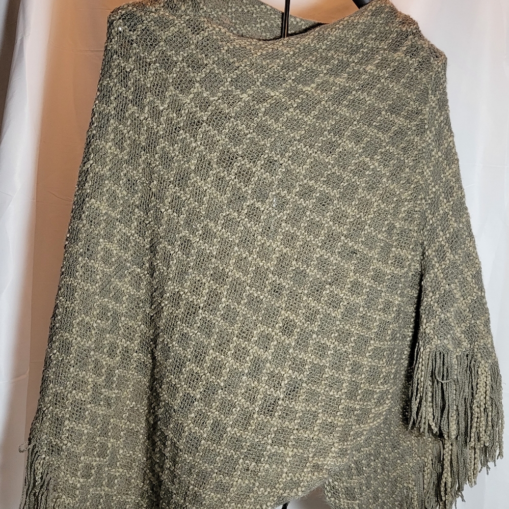 #1207 Fringed asymmetrical poncho.  One size